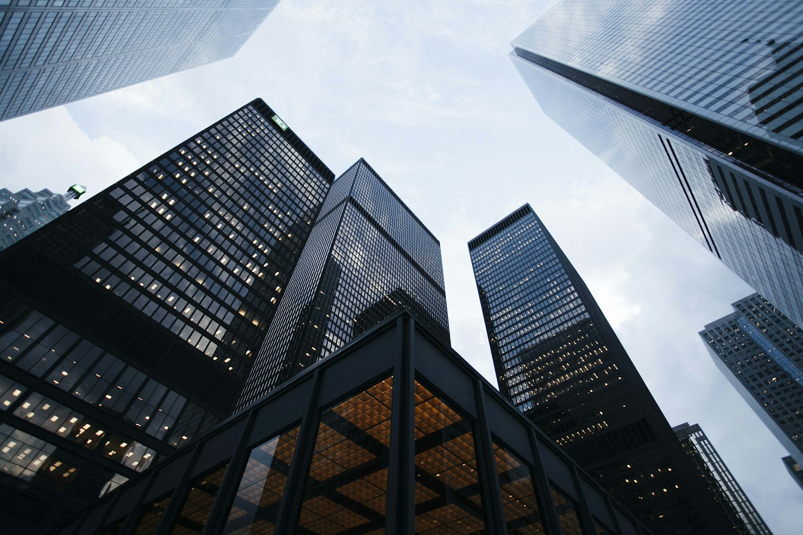 Glass office towers against a clear sky